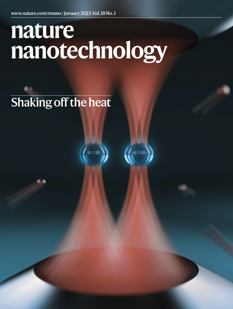 Cover of Nature Nanotechnology showing two spheres suspended by an apparatus.